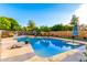 Sparkling in-ground pool with fenced yard and ample patio space at 908 N Creston --, Mesa, AZ 85213