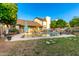 Beautiful backyard with pool, patio, and manicured landscaping at 908 N Creston --, Mesa, AZ 85213