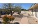 Exterior view of home and landscaped yard featuring desert plants and decorative gravel at 10039 W Lancaster Dr, Sun City, AZ 85351