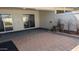Private patio area features brick pavers and outdoor living space at 10039 W Lancaster Dr, Sun City, AZ 85351