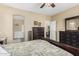 This bedroom features carpet and neutral walls, leading to the bathroom and an adjacent bedroom at 10583 S 175Th Ave, Goodyear, AZ 85338