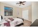 Comfortable bedroom featuring a ceiling fan, closet, and a relaxing ambiance with plenty of natural light at 10583 S 175Th Ave, Goodyear, AZ 85338