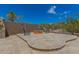 Outdoor backyard space with a fire pit perfect for relaxation and entertaining at 10583 S 175Th Ave, Goodyear, AZ 85338