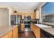 Efficient kitchen with stainless steel appliances and practical countertop space at 10583 S 175Th Ave, Goodyear, AZ 85338