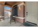 Inviting covered front porch with seating, perfect for relaxing outdoors at 10583 S 175Th Ave, Goodyear, AZ 85338