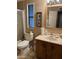 Functional bathroom featuring a combined tub and shower and coordinated fixtures at 11596 W Sierra Dawn Blvd # 209, Surprise, AZ 85378