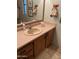 Well-lit bathroom featuring a sink with vanity and classic fixtures at 11596 W Sierra Dawn Blvd # 209, Surprise, AZ 85378