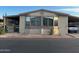 Charming single-story home with well-maintained landscaping and covered parking at 11596 W Sierra Dawn Blvd # 209, Surprise, AZ 85378