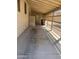 Covered patio area with ample space for outdoor seating and relaxation at 11596 W Sierra Dawn Blvd # 209, Surprise, AZ 85378