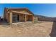 Spacious backyard with a covered patio and block wall for added privacy at 12143 W Marguerite Ave, Avondale, AZ 85323