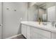Bright bathroom features a white vanity with modern fixtures and a spacious countertop at 12143 W Marguerite Ave, Avondale, AZ 85323