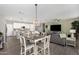Inviting dining area adjacent to kitchen and living spaces, perfect for entertaining at 12143 W Marguerite Ave, Avondale, AZ 85323