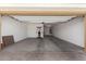 Spacious garage with ample room for parking and storage, featuring a concrete floor at 12143 W Marguerite Ave, Avondale, AZ 85323