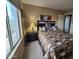Inviting bedroom with scenic views, comfortable furnishings, and warm lighting at 12237 W Sherman St, Avondale, AZ 85323