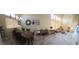 Open space combining dining area and living room featuring lots of natural light and decor at 12237 W Sherman St, Avondale, AZ 85323