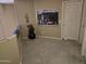 Landing area with carpet and a large image on the wall at 12237 W Sherman St, Avondale, AZ 85323