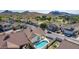 This aerial shot reveals a home with a private pool, close to a lush golf course at 1226 E Presidio Rd, Phoenix, AZ 85022