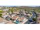 This aerial image shows a property with a pool, nestled within a vibrant, well-maintained residential area at 1226 E Presidio Rd, Phoenix, AZ 85022