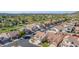 Aerial view showcasing a residential area bordered by a lush golf course and mature landscaping at 1226 E Presidio Rd, Phoenix, AZ 85022