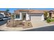 Charming home with a desert landscape and a tile roof, complemented by a two-car garage and inviting entrance at 1226 E Presidio Rd, Phoenix, AZ 85022