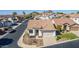 Charming single-story home with a two-car garage, low maintenance desert landscaping, and tile roof at 1226 E Presidio Rd, Phoenix, AZ 85022
