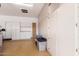 Spacious garage with ample storage cabinets, providing organization and convenience for homeowners at 1226 E Presidio Rd, Phoenix, AZ 85022