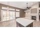 Kitchen island overlooking the outdoor space with a pool, and features a modern design and stainless steel appliances at 1226 E Presidio Rd, Phoenix, AZ 85022