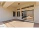 Covered patio features a sliding door to backyard pool, perfect for outdoor entertaining and relaxation at 1226 E Presidio Rd, Phoenix, AZ 85022