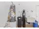 Features a water heater, water softener, and sink; essential for home maintenance and water quality at 1226 E Presidio Rd, Phoenix, AZ 85022