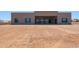 New construction backyard features a large blank canvas with many design opportunities at 1250 E Smokehouse Trl, Phoenix, AZ 85085