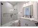 Contemporary bathroom featuring a glass-enclosed shower, modern vanity, and elegant fixtures for a spa-like experience at 1250 E Smokehouse Trl, Phoenix, AZ 85085