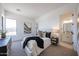 Serene bedroom featuring plush carpeting, a comfortable bed, and a view of an ensuite bathroom and walk-in closet at 1250 E Smokehouse Trl, Phoenix, AZ 85085