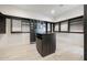 Spacious walk-in closet with custom shelving, storage cabinets, and a central island at 1250 E Smokehouse Trl, Phoenix, AZ 85085