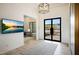 Welcoming entryway with a view to the office and desert landscape beyond at 1250 E Smokehouse Trl, Phoenix, AZ 85085