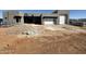 Contemporary home featuring a clean-lined design with a white sectional garage door on a sunny day at 1250 E Smokehouse Trl, Phoenix, AZ 85085