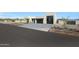 New construction with drought resistant landscaping and a stylish garage, promoting modern living at 1250 E Smokehouse Trl, Phoenix, AZ 85085