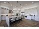 Bright kitchen showcasing a center island, pendant lighting and ample cabinetry at 1250 E Smokehouse Trl, Phoenix, AZ 85085