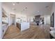 Spacious kitchen offers an island, stainless steel appliances, and a seamless transition to the living area at 1250 E Smokehouse Trl, Phoenix, AZ 85085