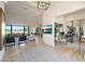 Open-concept living area with a view of the outdoor patio and kitchen at 1250 E Smokehouse Trl, Phoenix, AZ 85085
