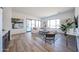 Bright living room featuring modern decor, hardwood floors, a comfortable sofa, and views at 1250 E Smokehouse Trl, Phoenix, AZ 85085
