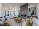 Elegant living room featuring a modern fireplace, stylish furnishings, and an inviting atmosphere at 1250 E Smokehouse Trl, Phoenix, AZ 85085