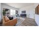 Inviting living room offering ample natural light, stylish decor, and a comfortable seating arrangement for relaxation at 1250 E Smokehouse Trl, Phoenix, AZ 85085