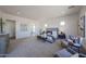 Large primary suite features sitting area, neutral colors, and natural light at 1250 E Smokehouse Trl, Phoenix, AZ 85085