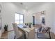 Bright office with neutral decor, large windows, and wood-look tile floors at 1250 E Smokehouse Trl, Phoenix, AZ 85085