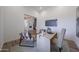 Cozy office with neutral decor, a work desk and a large TV at 1250 E Smokehouse Trl, Phoenix, AZ 85085