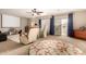 Spacious living room with neutral tones and access to the outdoors at 13313 W Palo Verde Dr, Litchfield Park, AZ 85340
