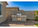 Backyard built-in BBQ and counter area for outside cooking at 13618 W Phacelia Ln, Peoria, AZ 85383