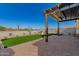 Outdoor living space with stone pavers, mature shrubs and xeriscaping at 13618 W Phacelia Ln, Peoria, AZ 85383