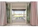 Inviting covered patio with comfortable seating and serene backyard views, great for outdoor relaxation at 13618 W Phacelia Ln, Peoria, AZ 85383