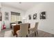 Dedicated home office provides a spacious desk area, artwork, and comfortable seating at 13618 W Phacelia Ln, Peoria, AZ 85383